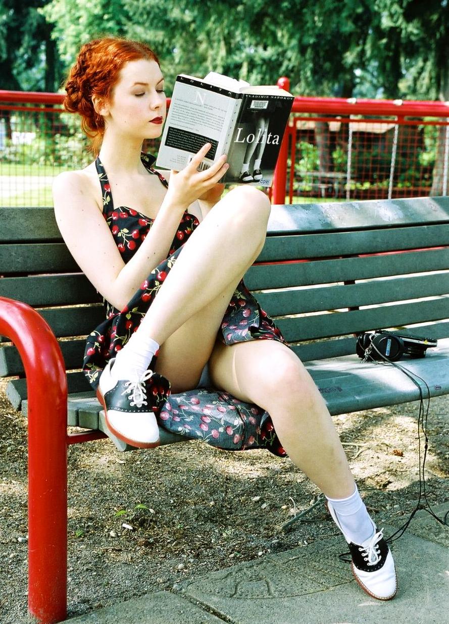 Redhead Lolita with Bare Legs wearing Colored Short Dress and Black and White Shoes